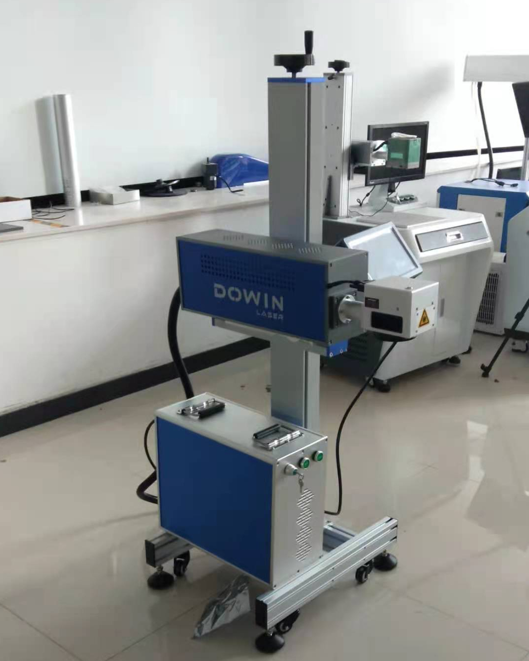 CO2 RF metal tube laser marking machine flying fast marking printing date on plastic packing bags water bottle