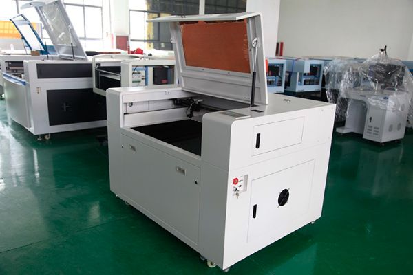 Leather cloth engraving and cutting machine  laser colthe cutting machine