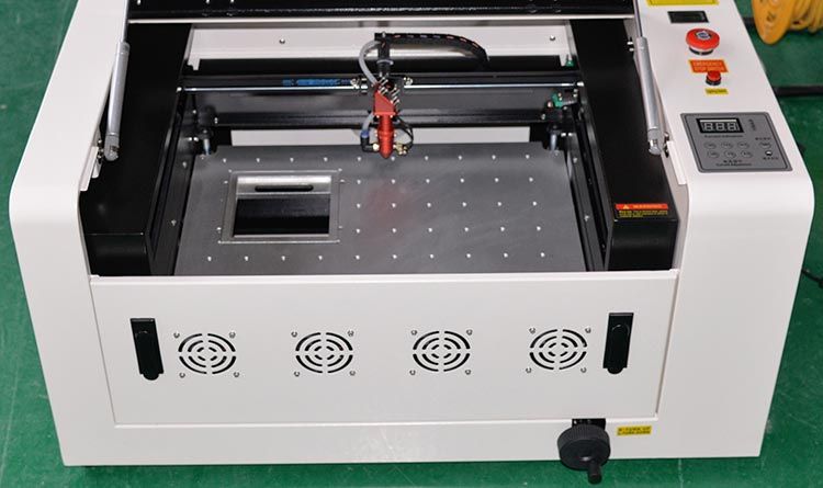 2022 latest popular 40W 3040 small desktop rubber stamp laser engraving and engraving machine