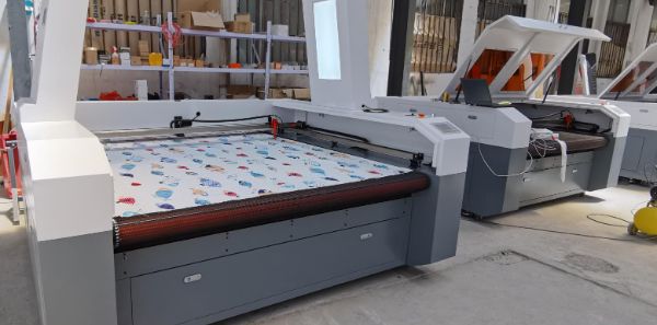 What are the advantages of 1814/1610 laser cloth cutting machine compared with other traditional cutting methods