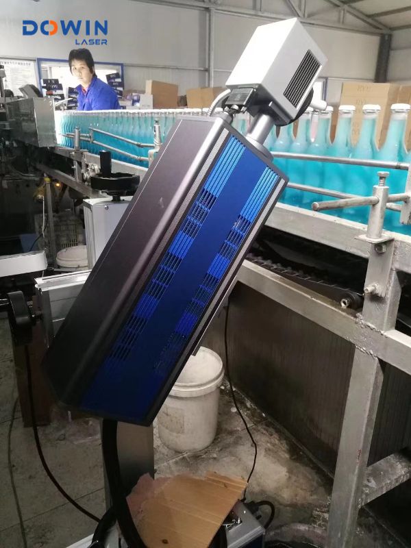 Flying conveyor belt 40w 50w co2 laser marking machine batch marking glass bottle production date