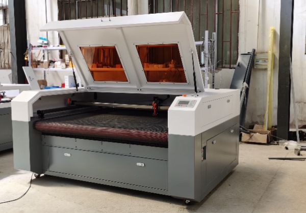 What kind of fabric can a laser fabric cutter be used to cut?